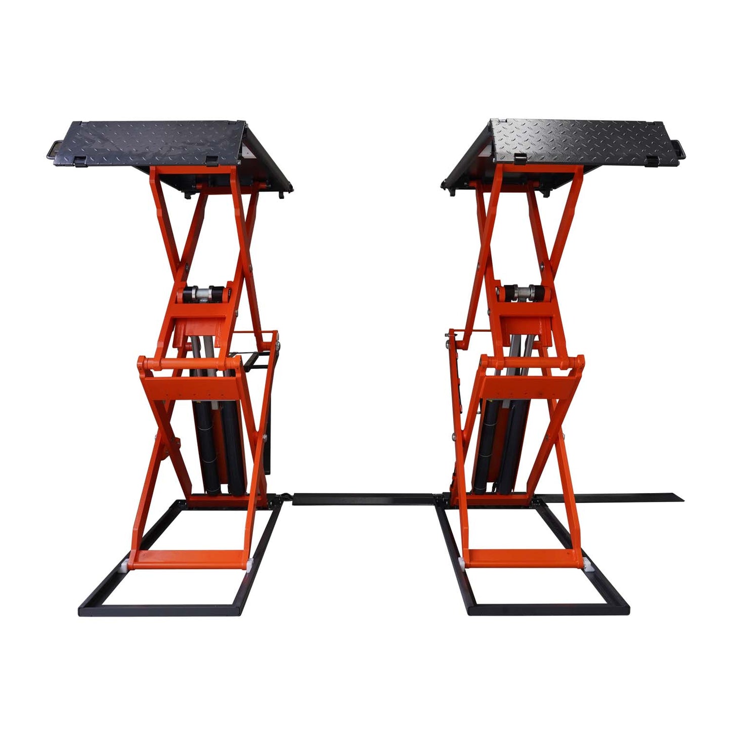 Front view of an orange scissor lifts in a workshop, designed for vehicle maintenance and lifting.