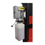 Close-up of the hydraulic pump and fluid reservoir on a two-post lift, featuring a lever, red button, and clear fluid container with markings on a black and red support. - 2 Post Clear Floor Hoist - 4.5 Ton | EE-C10V2