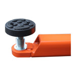 A close-up of a textured rubber pad on a screw mechanism, mounted on the arm of a car hoist, designed to securely support and protect the vehicle chassis during lifting. - 2 Post Baseplate Hoist - 4.5 Ton | EE-F10