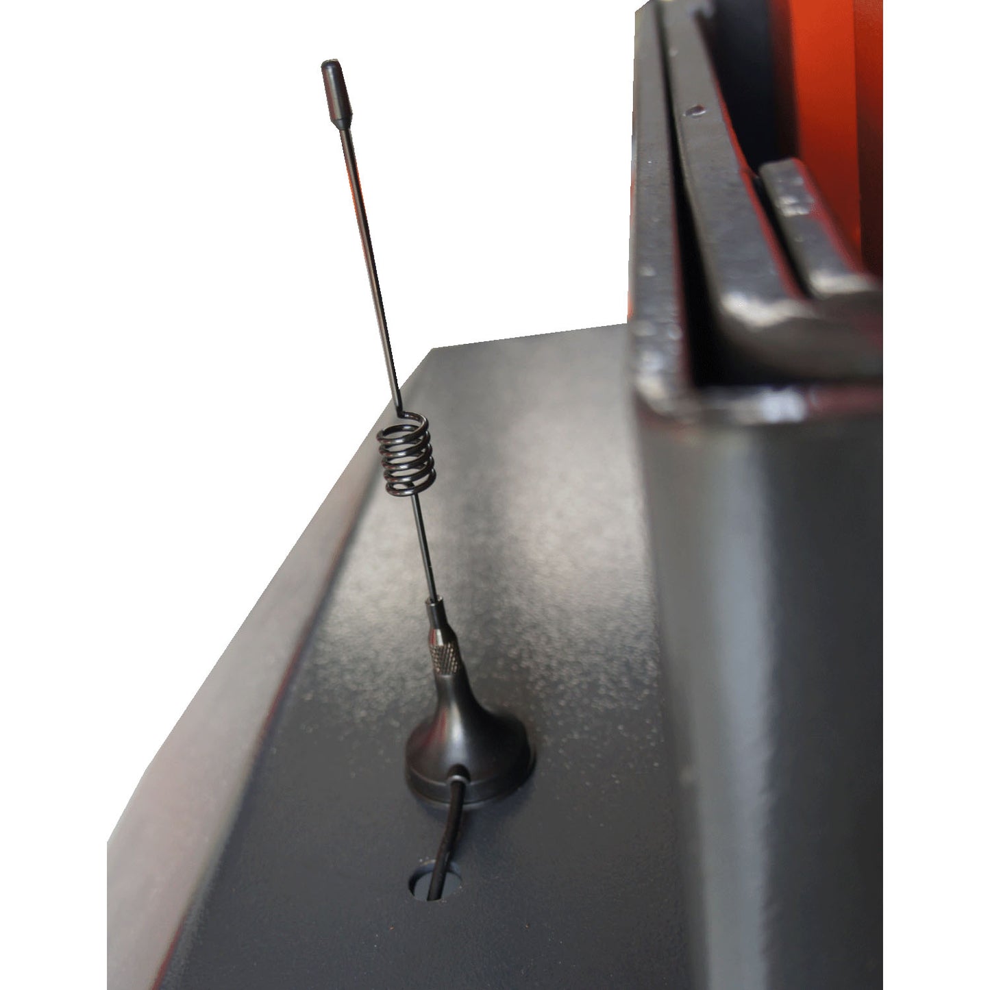 Close-up of a small antenna on a mobile column lift, indicating wireless connectivity or remote control capability.