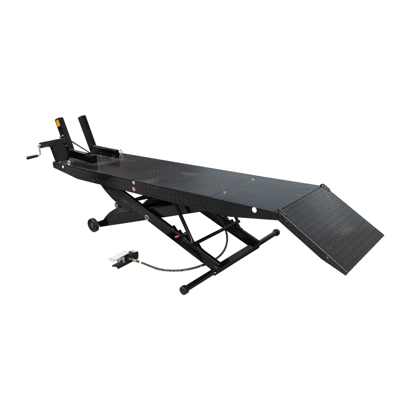 Hydraulic motorcycle hoist with a black diamond plate surface and ramp, designed for lifting and securing motorcycles during maintenance and repairs. - Motorcycle Hoist Drop Tail with Width Extension Kit