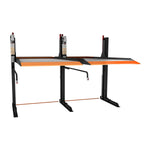 2 post car hoists next to eachother with a sturdy dark grey frame and orange safety accents, designed for lifting and parking automotive vehicles. - 2 Post Parking Hoist - Full Platform Compact - 2.7 Ton | TL2.7HP