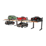 Multiple-platform 2 post car hoist system in use, lifting several vehicles including SUVs and sports cars, showcasing its capacity for simultaneous vehicle parking and storage. - 2 Post Parking Hoist - Full Platform Compact - 2.7 Ton | TL2.7HP