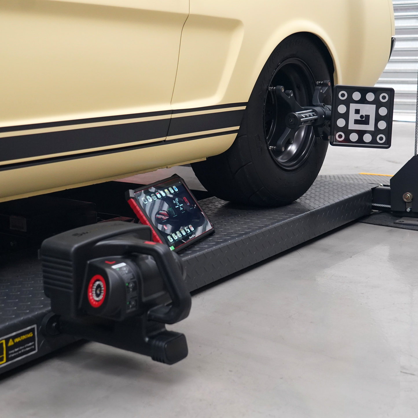 Wireless 3D Wheel Aligner in use