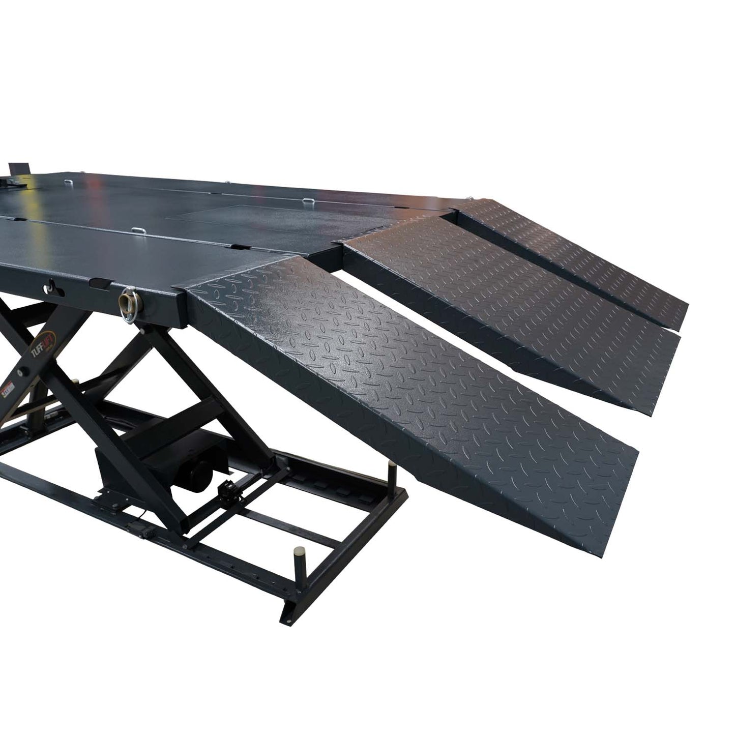 Close-up view of a motorcycle hoist with three diamond-plate ramps, showcasing its robust construction. The ramps provide easy access for motorcycles, while the wide platform offers stability for maintenance work.