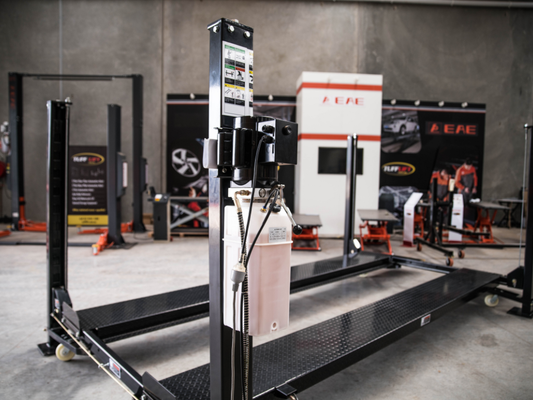A set up car hoist in a workshop