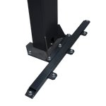 A close-up of a black column support bracket with multiple secured bolts, attached to a vertical column on a marbled floor, providing reinforcement for structural stability - EAE Column Support Kit