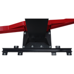 Close-up of the base of a vehicle lift column showing the black support bar with bolted connections, flanked by the red angular arms of the lift structure. - Column Support Kit