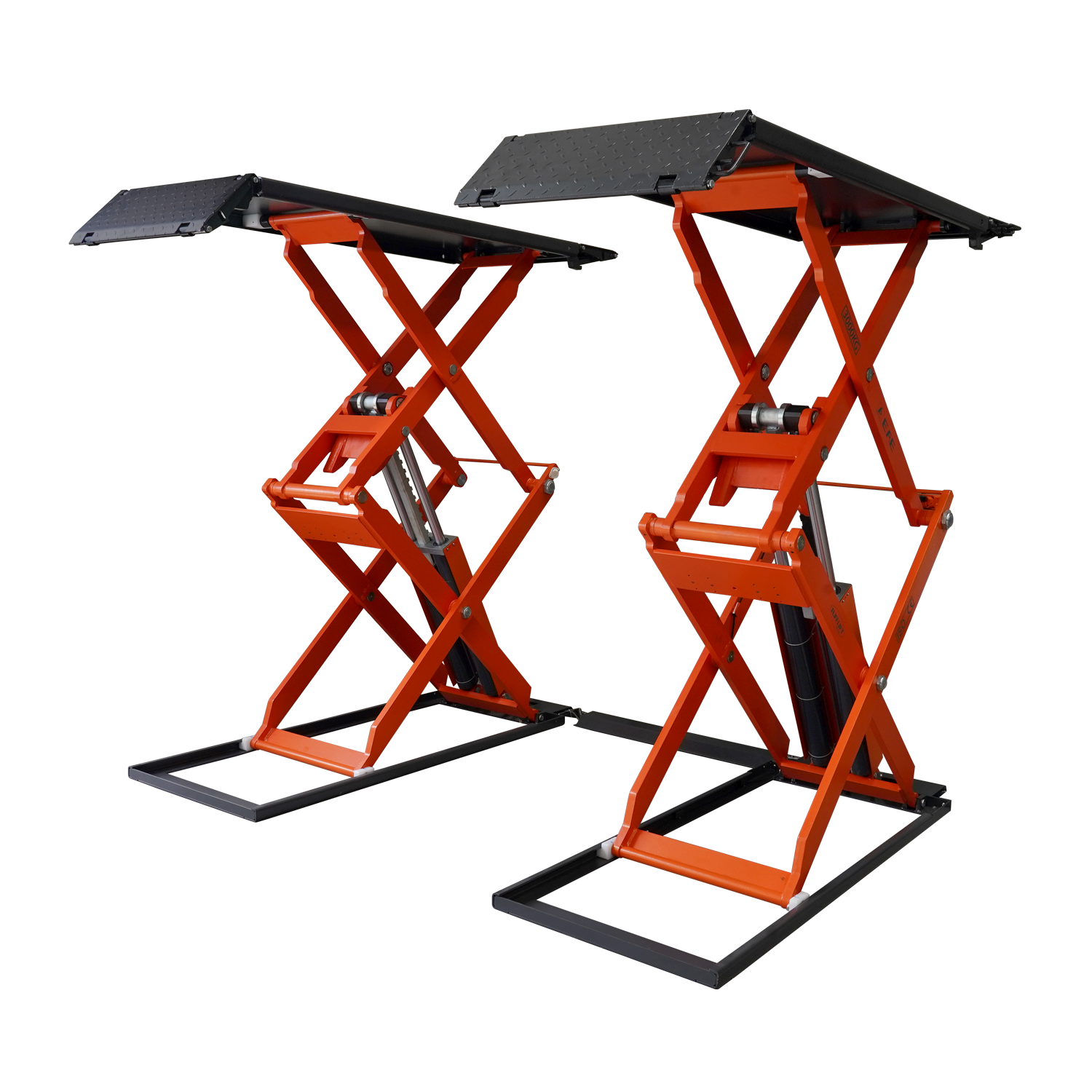 An orange scissor lift in a workshop, designed for lifting vehicles for maintenance and repairs. 