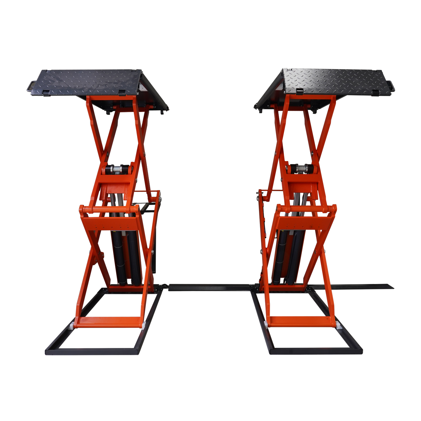 Front view of an orange scissor lifts in a workshop, designed for vehicle maintenance and lifting.