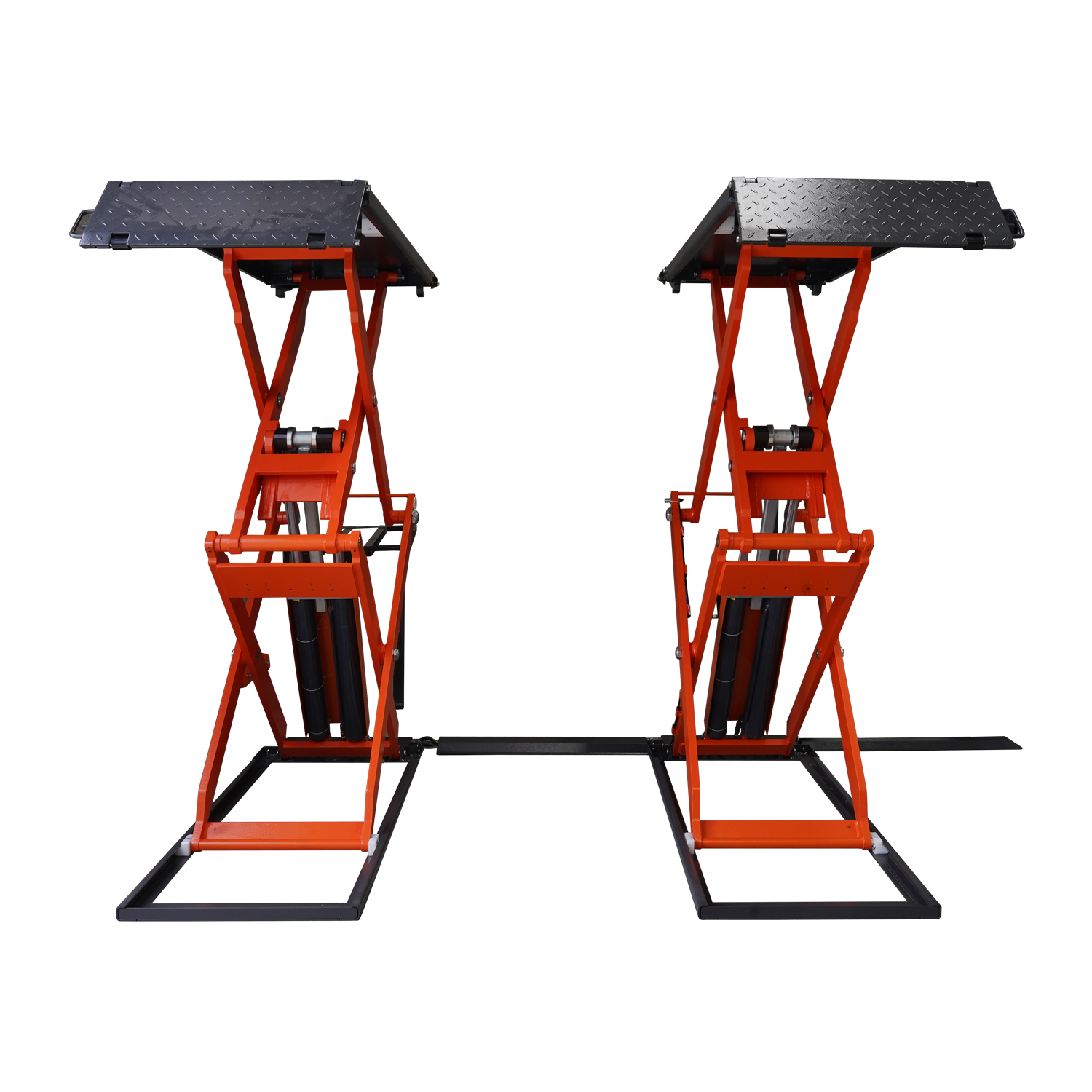 Front view of an orange scissor lifts in a workshop, designed for vehicle maintenance and lifting.