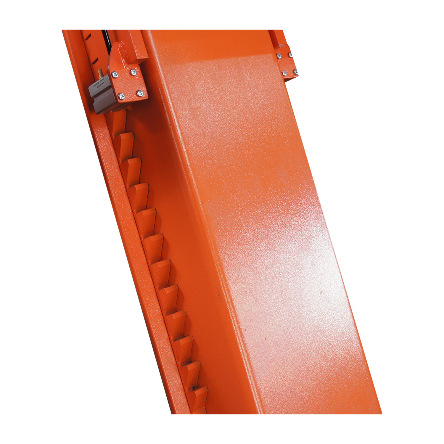 Close-up of the orange locking mechanism on a scissor lift, featuring a notched design for securing the lift at various heights. 