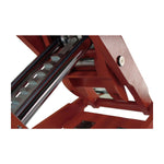 Close-up of the internal lifting mechanism of a scissor lift, featuring sturdy metal components and a notched rail for adjusting height. 