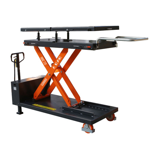 Scissor lift table with orange supports and black platform, designed for lifting and transporting heavy loads in a workshop