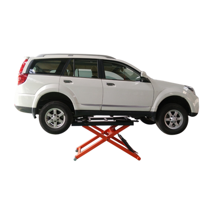 A white SUV elevated on an orange EAE hydraulic scissor lift platform. The platform is positioned under the vehicle, with all four wheels off the ground