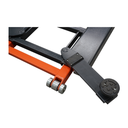 A close-up of the corner section of an orange and black EAE hydraulic scissor lift, focusing on the roller wheels and one of the adjustable lifting arms with a circular pad.