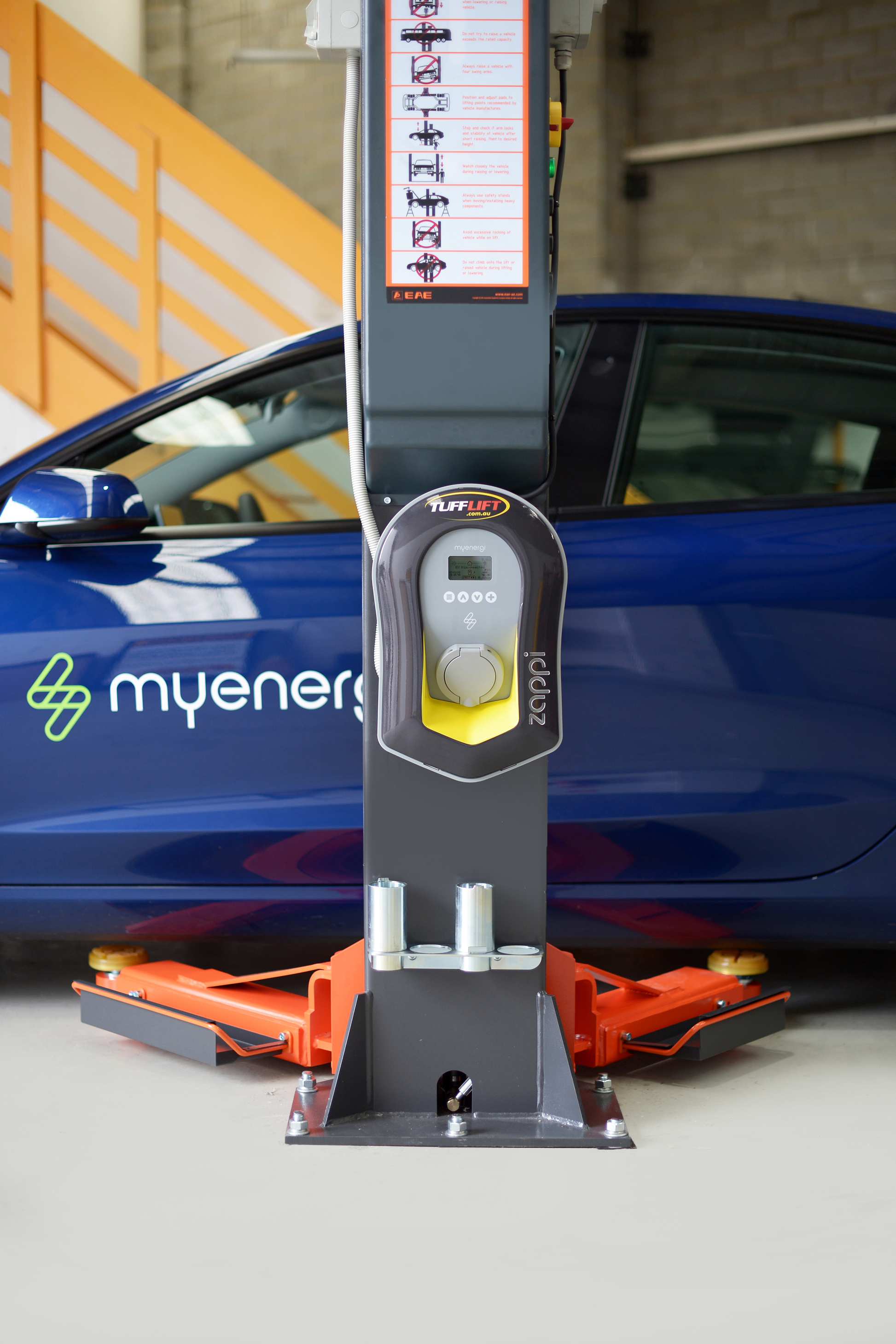 Zappi 7kw Untethered EV Charge Station mounted on a 2 post car hoist