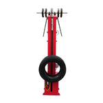 Red Mezzanine Tyre Elevator with a tyre on it