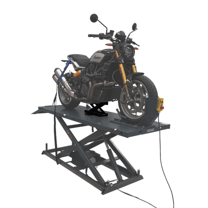 A motorcycle is securely positioned on a motorcycle hoist, with a optional jack lifting the bike for maintenance. The hoist is equipped with tie-downs and a control panel for easy operation.