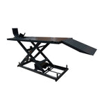 A motorcycle hoist with electric over hydraulic operation, designed to lift up to 680 kg. This sturdy hoist features a steel ramp and a stable platform, ideal for secure motorcycle maintenance and repairs.