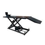 A motorcycle hoist with electric over hydraulic operation, designed to lift up to 680 kg. This sturdy hoist features a steel ramp and a stable platform, ideal for secure motorcycle maintenance and repairs.