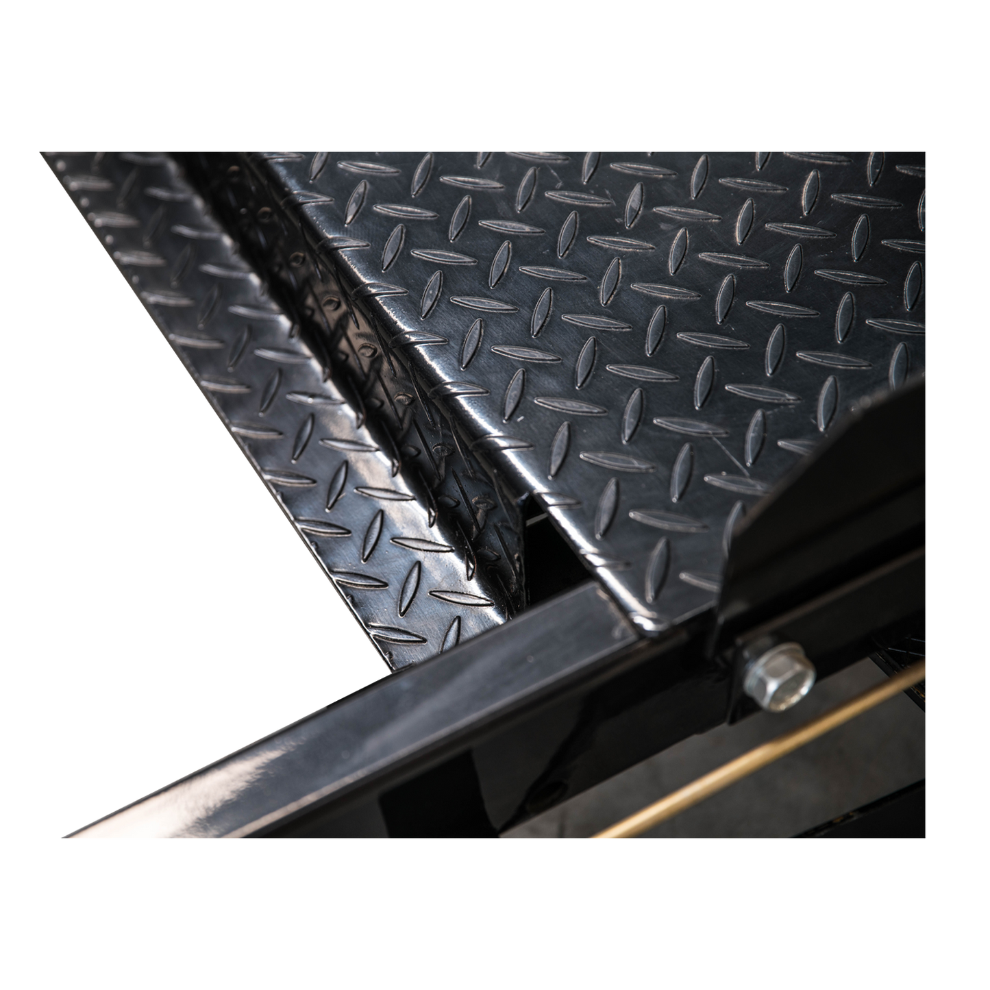 Detailed close-up of the TL3.6PH 4 post hoist’s diamond-plated surface, showcasing its durable, non-slip texture designed to ensure secure vehicle placement.