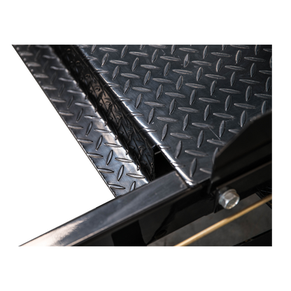 Detailed close-up of the TL3.6PH 4 post hoist’s diamond-plated surface, showcasing its durable, non-slip texture designed to ensure secure vehicle placement.