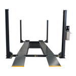 Front view of the 4 post car hoist model TL4.0PH in a workshop, showcasing the steel platform and diamond-plate ramps, ready for vehicle lifting or servicing.