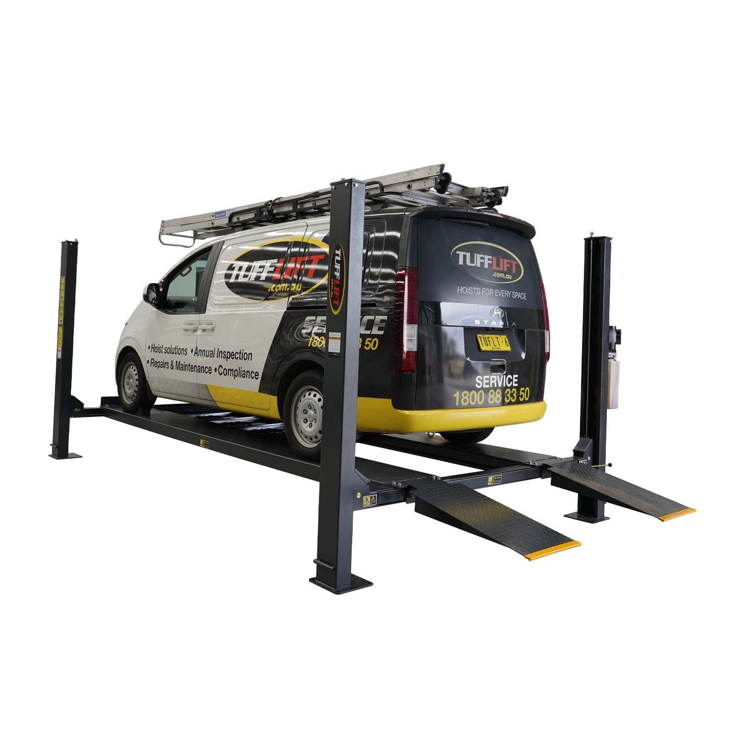 4 post hoist lifting a Tufflift service van in a workshop, showcasing the hoist's capability for vehicle maintenance and inspections