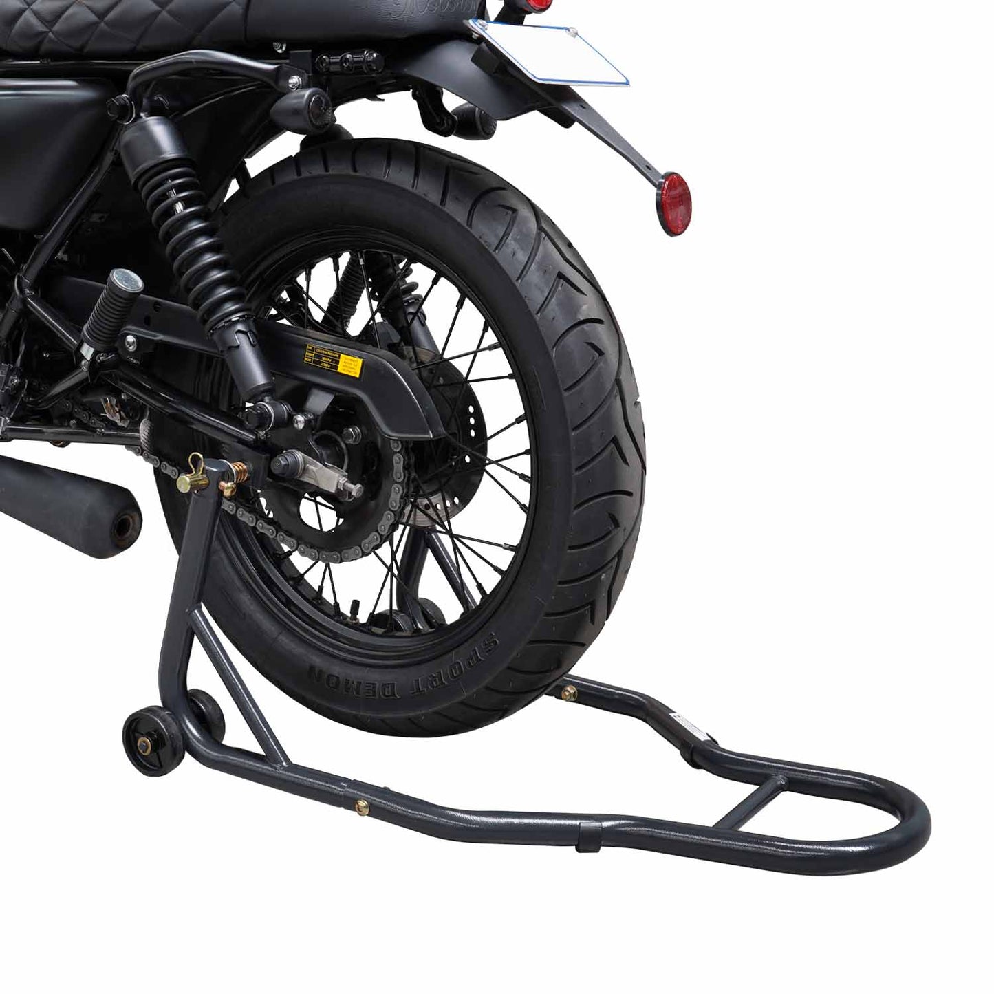 This image shows a rear wheel motorcycle stand supporting a bike from the back. The motorcycle's rear tire is lifted off the ground, allowing for maintenance, cleaning, or tire work. The stand features two support arms with wheels for easy positioning and balance, ensuring the motorcycle remains stable while elevated.