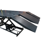 Close-up view of a motorcycle hoist with three diamond-plate ramps, showcasing its robust construction. The ramps provide easy access for motorcycles, while the wide platform offers stability for maintenance work. 