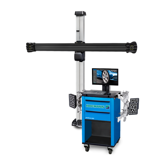 A blue Hofmann Geoliner 660 wheel aligner with a digital display and sensor arms, used for precise vehicle alignment. The system includes an overhead camera bar for capturing alignment data.