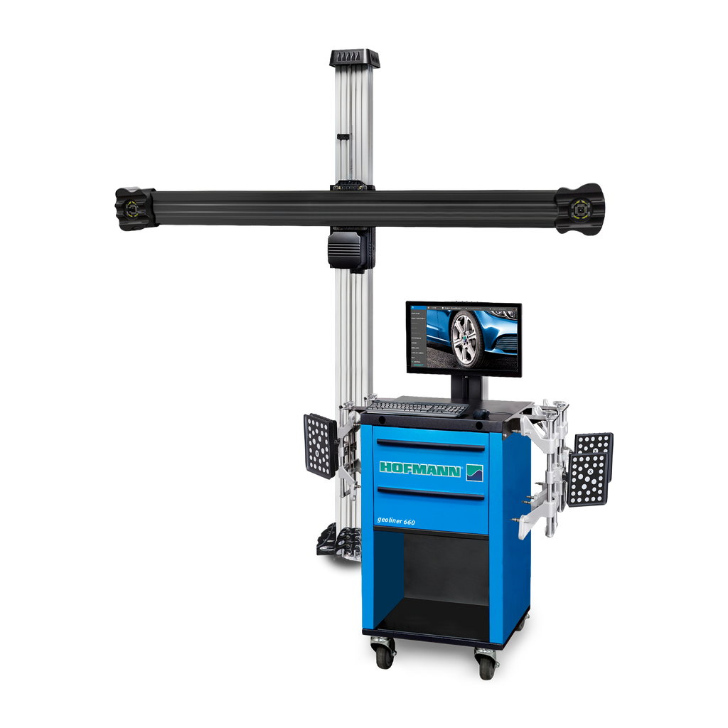 A blue Hofmann Geoliner 660 wheel aligner with a digital display and sensor arms, used for precise vehicle alignment. The system includes an overhead camera bar for capturing alignment data.